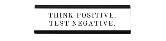 think positive. test negative. | dramatically disengaged desk sign