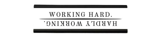 working hard/hardly working | dramatically disengaged desk sign