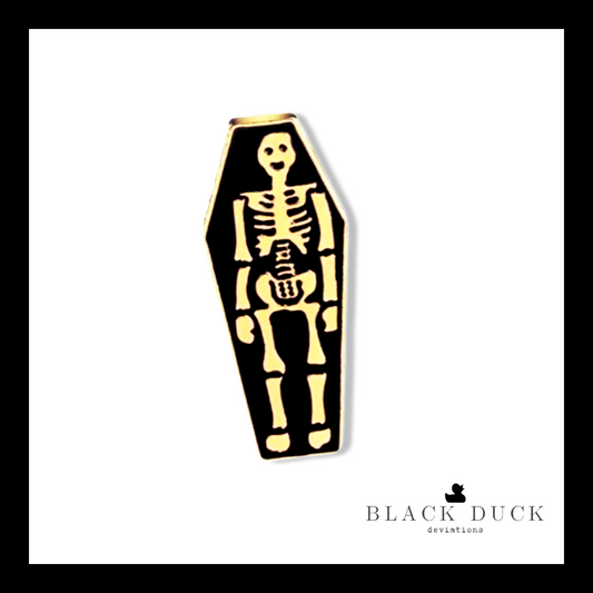 golden skeleton + casket | brooch