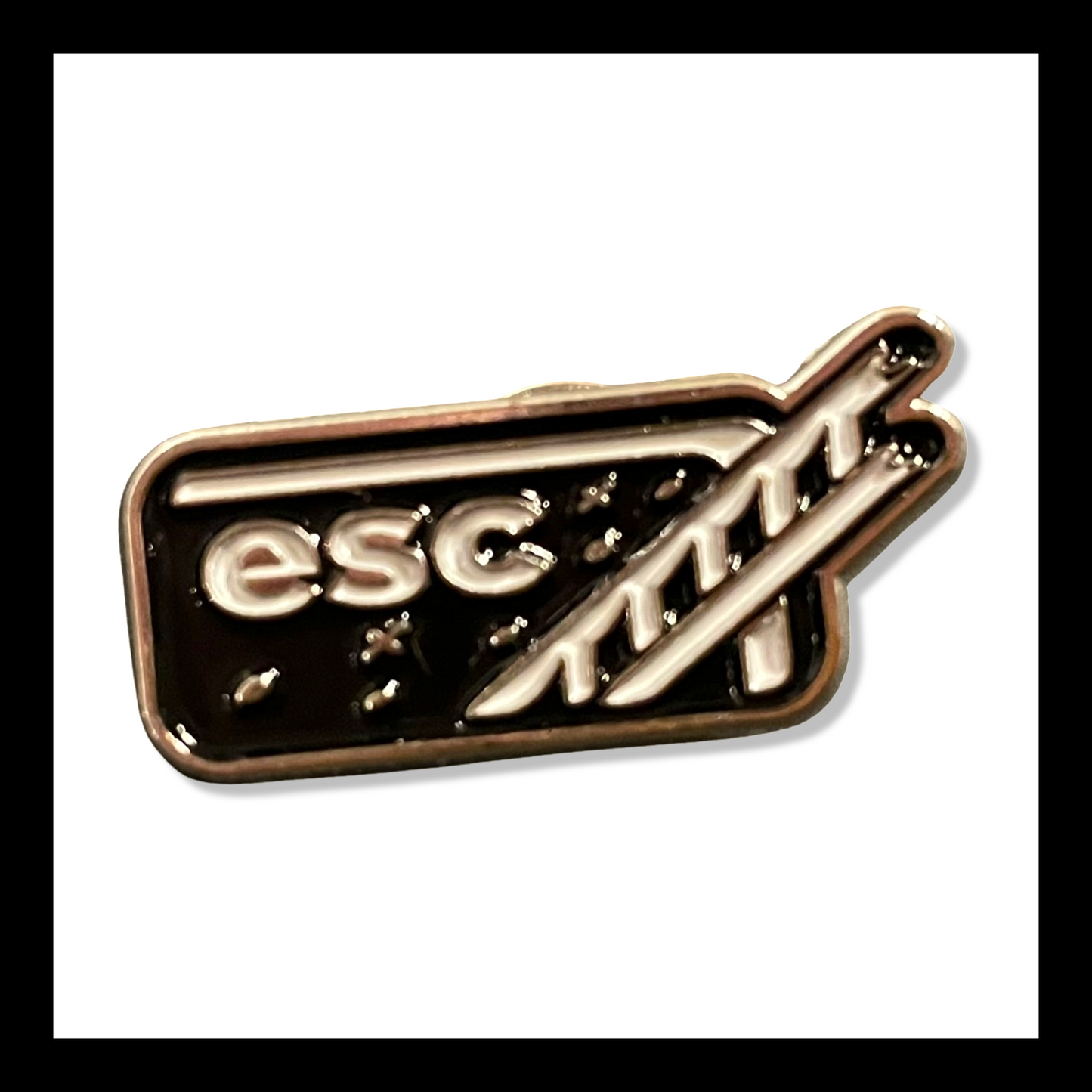 escape key | brooch